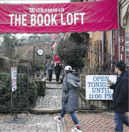  ?? PHOTOS: JONATHAN ELDERFIELD/THE ASSOCIATED PRESS ?? The Book Loft of German Village in Columbus, Ohio, which opened more than 40 years ago, features 150,000 individual titles and over 500,000 books in stock. The store brims with shoppers and is open seven days a week.