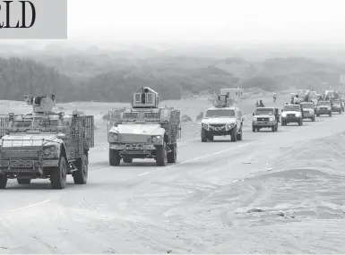  ?? NABIL HASSAN/AFP/GETTY IMAGES ?? A column of Yemeni pro-government forces and armoured vehicles arrives near Hodeidah airport on Wednesday, in an offensive that is targeting the port where most of the country’s food arrives, sparking famine concerns.