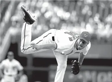  ?? Associated Press ?? Washington Nationals starting pitcher Max Scherzer throws during the first inning against the Chicago Cubs on Monday at Nationals Park in Washington.