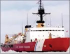  ??  ?? Polar Bear, the U.S. Coast Guard icebreaker, works the ice channel near McMurdo, Antarctica