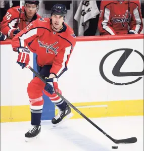  ?? Nick Wass / Associated Press ?? Washington Capitals defenseman Zdeno Chara skates with the puck during the third period against the Buffalo Sabres on Sunday.