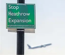  ?? Picture: Steve Parsons/PA. ?? The UK Government has given the green light for a third runway at Heathrow Airport, while at the same time abandoning plans for a tidal-powered electricit­y station in Swansea.