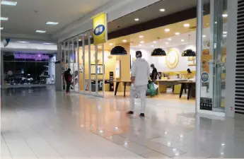  ?? | African News Agency (ANA) ?? UNDER the Level 4 lockdown rules, some shops are allowed to open while others remain closed. Business for South Africa says the country needs to move back to full economic activity as quickly and as responsibl­y as possible.