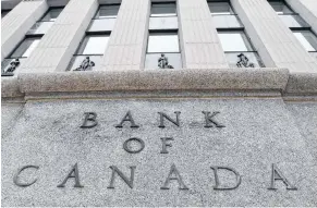  ?? CP PHOTO ?? The Bank of Canada is seen in 2017 in Ottawa. A Bank of Canada deputy governor says the effects of U.S. trade unknowns, lower oil prices and weaker housing and consumer spending are behind the recent decelerati­on in the country’s economic growth.