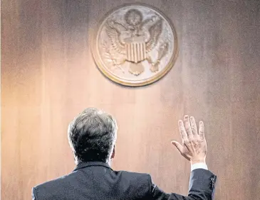  ??  ?? IN POLE POSITION: Brett Kavanaugh is sworn in before the US Senate Judiciary Committee on Capitol Hill in Washington last month.