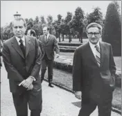  ??  ?? In this December 1972 image, President Nixon is seen with then US secretary of state Henry Kissinger (right) in Paris
GETTY IMAGES