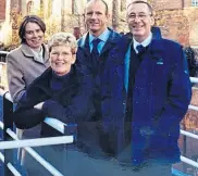  ?? PHOTO SUPPLIED ?? Nancy Johnson, front, at the footbridge over the water overflow on the Nottingham Canal.