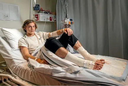  ?? PHOTO: FAIRFAX ?? Sam Kanizay, 16, was bitten by sea fleas at Brighton Beach while soaking his legs after an Australian Rules football match.