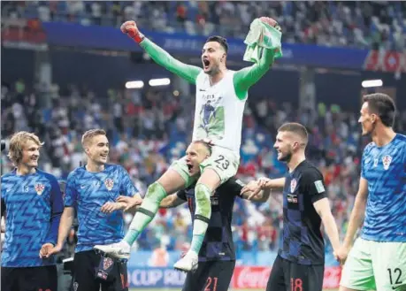  ?? REUTERS ?? Croatia goalkeeper Danijel Subasic was the toast of his team after winning the penalty shootout against Denmark.