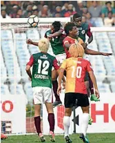  ??  ?? Action during the I-League match between Mohun Bagan and East Bengal in Kolkata on Sunday.