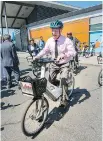  ?? PETER MCCABE ?? Laval Mayor Marc Demers tries an electric bike on Thursday.