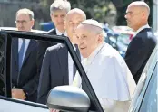  ?? FILIPPO MONTEFORTE TNS ?? Pope Francis arrives at The Vatican’s Porta del Perugino gate on Friday after being discharged from the Gemelli hospital in Rome, where he underwent abdominal surgery last week.
