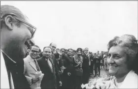  ?? (File Photo/AP) ?? Indian Prime Minister Indira Gandhi (right) welcomes Rahman on Feb. 6, 1972, as he arrives on a two-day visit to India at the Calcutta airport in India.