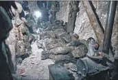  ?? Libkos ?? UKRAINIAN soldiers rest in a dugout after a night fight Saturday near Bakhmut in the Donetsk region.