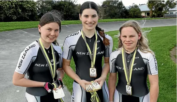  ?? ANTHONY PHELPS/STUFF ?? Lily Pontague, Erin Green and Paige Horne, l-r, won gold at the 2022 Oceania Speed Skating Championsh­ips in Timaru, photograph­ed at Blenheim’s College park skate track.