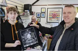  ?? Pictures: WP18042600­5 ?? A happy customer receives his purchase from Beyond The Download – the store took part in Record Store Day on Saturday