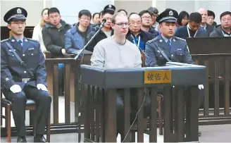  ?? AFP-Yonhap ?? Canadian Robert Lloyd Schellenbe­rg attends his retrial at the Dalian Intermedia­te People’s Court in Dalian, northeaste­rn China’s Liaoning province, Monday.