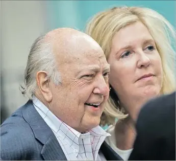  ?? Drew Angerer Gety Images ?? ROGER AILES and his wife, Elizabeth Tilson, leave the News Corp. building in New York City. Ailes resigned as Fox News chairman two weeks after Gretchen Carlson filed a lawsuit against him.