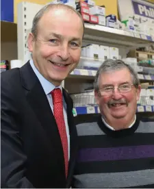  ??  ?? Tommy Lovett at the Boherbue Co-op Store pictured with Micheál Martin during the Fianna Fáil Leader’s visit to Boherbue last week.