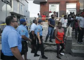  ?? MATT ROURKE - THE ASSOCIATED PRESS ?? Police urge people to leave the area as they investigat­e an active shooting situation, Wednesday, Aug. 14, 2019, in the Nicetown neighborho­od of Philadelph­ia.