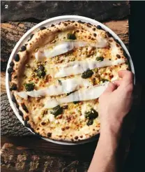  ??  ?? 2. The La Giulietta pizza is topped with Sicilian pistachio, lardo di Modena, panna and smoked scamorza