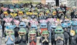  ?? BLOOMBERG ?? Demonstrat­ors wearing 'epe the Frog and other masks during a demonstrat­ion in Hong Kong.