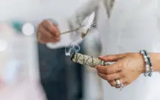  ?? Istockphot­o by Getty Images ?? A bundle of dried sage can be used in a smudging ritual, cleansing negative energy and purifying living space with smoke.