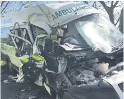  ??  ?? The mangled wreck of the ambulance on the Portaferry Road