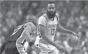  ?? TROY TAORMINA, USA TODAY SPORTS ?? All- Star guard James Harden, right, signed a contract extension with the Rockets that guarantees him $ 228 million over the next six seasons.