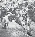  ?? OHIO STATE UNIVERSITY ARCHIVES ?? Cy Souders (66) throws a block for Ohio State running back Ernie Parks during the 1943 season.