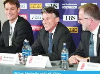  ??  ?? IAAF head Sebastian Coe (centre) with officials.