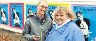  ?? PHOTO: STEPHEN JAQUIERY ?? Friends with tickets . . . Ed Sheeran fans Erin Davis (left), and Debbie Waide, both of Dunedin, met in the queue for tickets at Forsyth Barr Stadium yesterday.