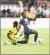  ?? ?? PSG’s Nuno Mendes (center), challenges for the ball with Nantes’ Marcus Coco (left), and Nantes’ Jean-Charles Castellett­o during the French Super Cup final soccer match between Nantes and Paris Saint-Germain at Bloomfield Stadium in Tel Aviv, Israel. (AP)