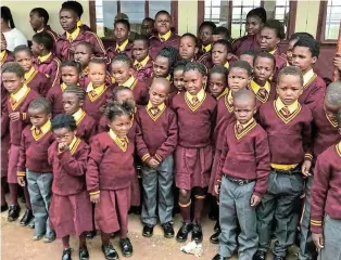  ?? Picture: SUPPLIED ?? ENCOURAGIN­G EDUCATION: Upper Ngonyama Primary School pupils in their new school uniforms donated by the South African Social Security Agency (Sassa) in Chris Hani