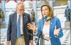  ?? AP ?? Senate Minority Leader Chuck Schumer (D-N.Y.), joined by House Speaker Nancy Pelosi, warned Sunday the clock is ticking on relief.