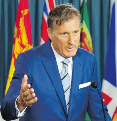  ?? ADRIAN WYLD / THE CANADIAN PRESS ?? Maxime Bernier announces he is leaving the Tory party in Ottawa on Thursday, on the eve of the party convention.