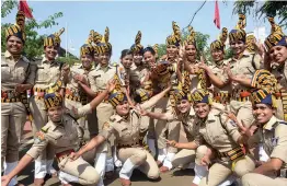  ?? — PTI ?? Newly- recruited police officials celebrate after completion of their one- year training at Madhya Pradesh Police Academy at Bhauri, near Bhopal, on Monday.