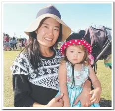  ??  ?? There was plenty to entertain Sakura Kawashimo, 2, and mum Hina Kawashimo at the Gold Coast Multicultu­ral Festival.