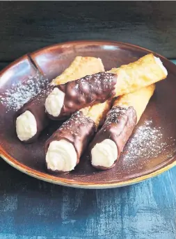  ?? JAMES TSE ?? Homemade cannoli is worth the time investment, chef Mark McEwan writes. The filling in this recipe is creamy and slightly sharp.