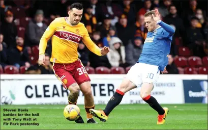  ?? ?? Steven Davis battles for the ball with Tony Watt at Fir Park yesterday