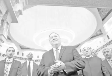  ??  ?? Pompeo speaks with journalist­s as he tours the newly-inaugurate­d Al-Fattah Al-Alim mosque, in Egypt’s New Administra­tive Capital (NAC). — Reuters photo