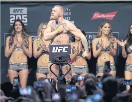  ??  ?? Conor McGregor weighs in before a fight last year.