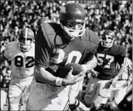  ??  ?? Chuck Dicus scores the game’s only touchdown during Arkansas’ 16-2 victory over Georgia in the 1969 Sugar Bowl at New Orleans. It was the first meeting between the Hogs and Bulldogs. (AP file photo)