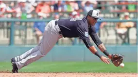  ?? BUTCH DILL, USA TODAY SPORTS ?? Former Cubs standout Starlin Castro, playing shortstop in a spring training game March 10, is expected to stabilize the Yankees’ second-base position.