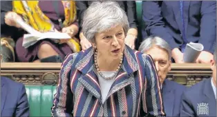  ?? AP PHOTO ?? Britain’s Prime Minister Theresa May makes a statement on Brexit to the House of Commons in London Monday.