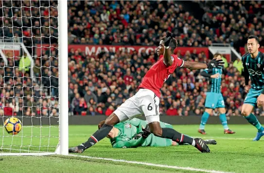  ?? PHOTOS: GETTY IMAGES ?? Paul Pogba ‘scores’ for Manchester United against Southampto­n but the goal was correctly ruled out for offside.