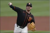  ?? ASHLEY LANDIS — THE ASSOCIATED PRESS, FILE ?? Giants manager Gabe Kapler announced Wednesday that right-hander Kevin Gausman, above, will start for the team on Opening Day against the Mariners at T-Mobile Park.