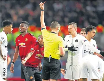  ??  ?? Paul Pogba is shown the red card at Old Trafford against PSG