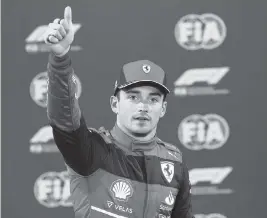  ?? GIUSEPPE CACACE AP ?? Ferrari driver Charles Leclerc of Monaco celebrates taking the pole after the final qualifying session for the Formula One Bahrain Grand Prix in Sakhir, Bahrain.