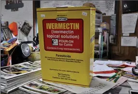  ?? (Arkansas Democrat-Gazette/Lara Farrar) ?? A box of Ivermectin used to treat parasites in livestock sits at Clark County Livestock Feed in Arkadelphi­a. Owner William Burks said customers have been buying up all the topical forms of the medication.